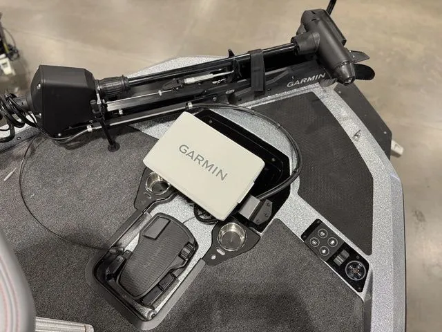 Slide: The Image of 2026 Ikon Boats LXE20 featuring Garmin navigation system and trolling motor on deck. - 13