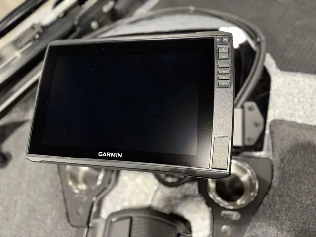Slide: The Image of Garmin display on 2026 Ikon Boats LXE20 dashboard, showcasing modern navigation technology. - 14