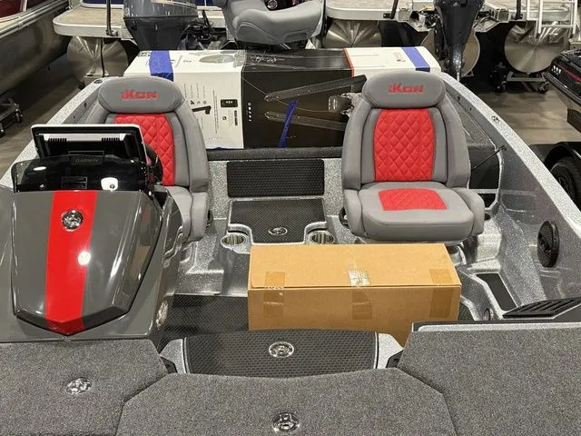 Slide: The Image of 2026 Ikon Boats LXE20 interior with red and gray seats, showcasing modern design and packaging. - 16