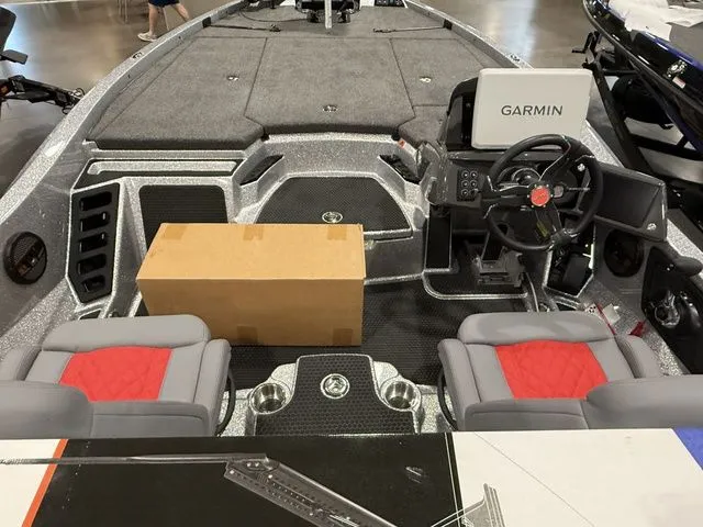 Slide: The Image of 2026 Ikon Boats LXE20 interior with Garmin system, dual seats, and spacious deck. - 8