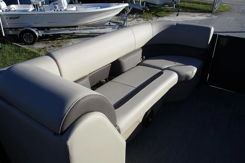 Slide: The Image of 2026 Bentley Pontoons Legacy 243 Swingback with luxurious seating arrangement. - 10