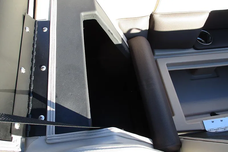 Slide: The Image of Interior view of 2026 Bentley Pontoons Legacy 243 Swingback, showcasing seating and storage area. - 12