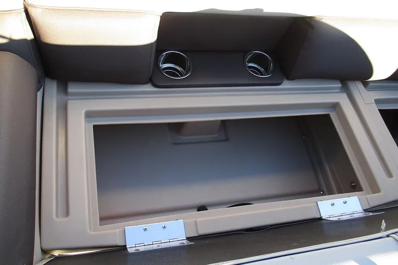 Slide: The Image of Interior storage compartment of 2026 Bentley Pontoons Legacy 243 Swingback with cup holders. - 13