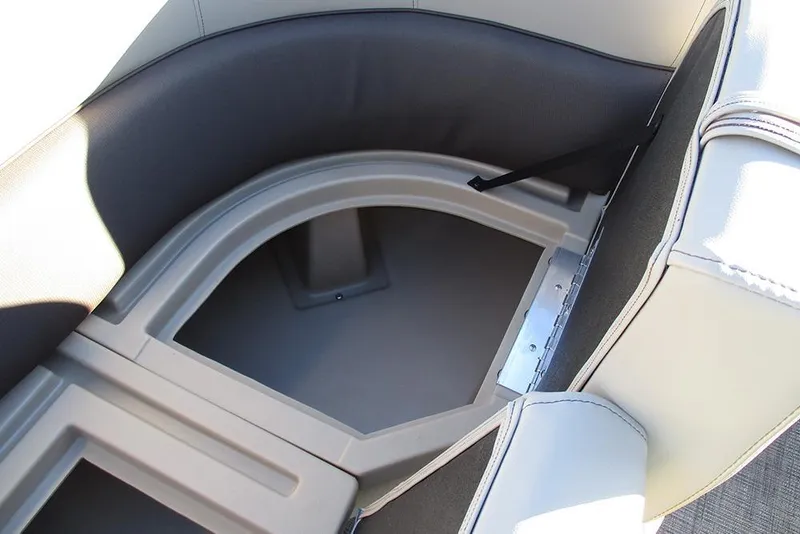 Slide: The Image of 2026 Bentley Pontoons Legacy 243 Swingback storage compartment with cushioned seating. - 14