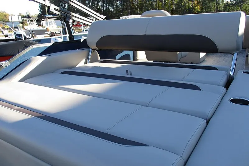 Slide: The Image of 2026 Bentley Pontoons Legacy 243 Swingback with luxurious seating and sleek design. - 17