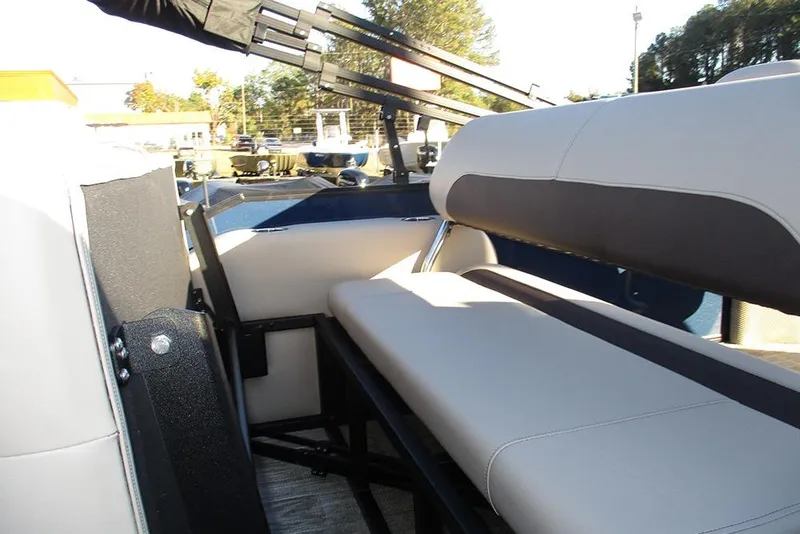 Slide: The Image of 2026 Bentley Pontoons Legacy 243 Swingback interior seating with sleek design and comfortable upholstery. - 18