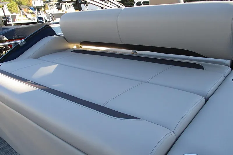 Slide: The Image of 2026 Bentley Pontoons Legacy 243 Swingback interior seating, featuring luxurious gray upholstery. - 20
