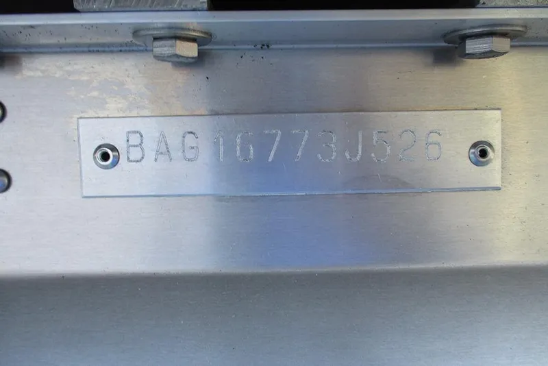Slide: The Image of Hull identification number on a 2026 Bentley Pontoons Legacy 243 Swingback. - 27