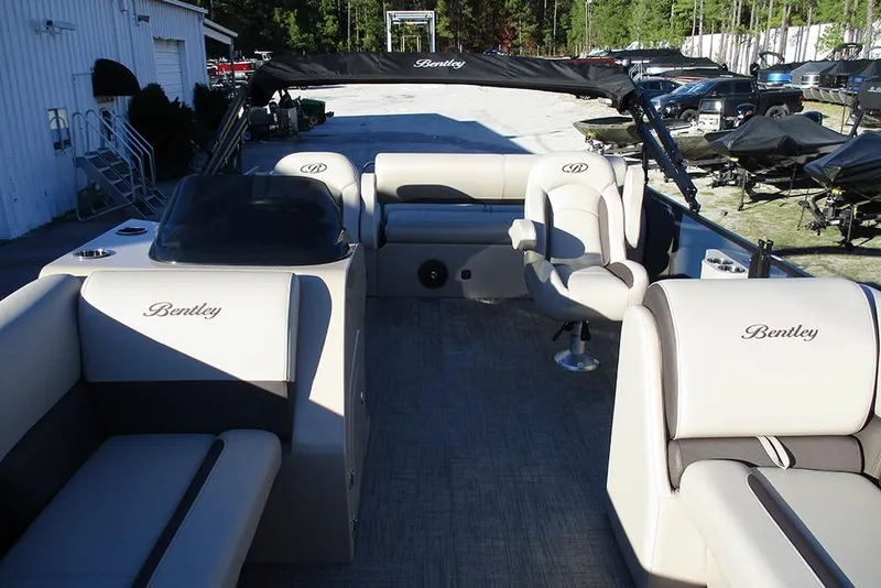 Slide: The Image of 2026 Bentley Pontoons Legacy 243 Swingback interior with luxurious seating and elegant design. - 8