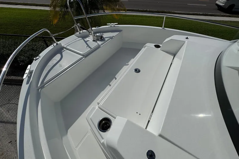 Slide: The Image of 2026 Jeanneau NC Sport 795 Series 2 boat deck, featuring sleek design and stainless steel railings. - 10
