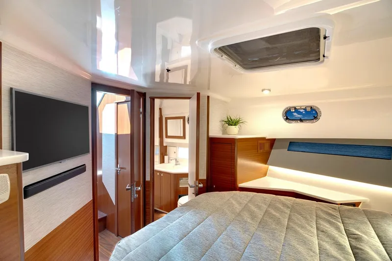 Slide: The Image of Manufacturer Provided Image: Luxurious interior of 2025 Pursuit OS 445 Offshore yacht with modern amenities. - 21