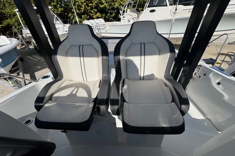 Slide: The Image of Luxury seating on 2026 Jeanneau Leader 9.0 WA Series 2 boat, featuring sleek design. - 17