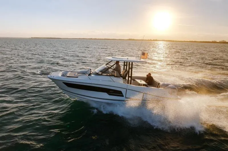 Slide: The Image of 2026 Jeanneau Leader 9.0 WA Series 2 boat interior with seating and table. - 3