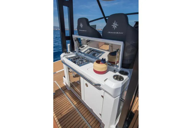 Slide: The Image of 2026 Jeanneau Leader 9.0 WA Series 2 cockpit with Garmin navigation system and dual seating. - 6