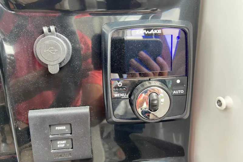 Slide: The Image of Control panel of 2026 Jeanneau NC 795 Series 2 boat with Zipwake system. - 26