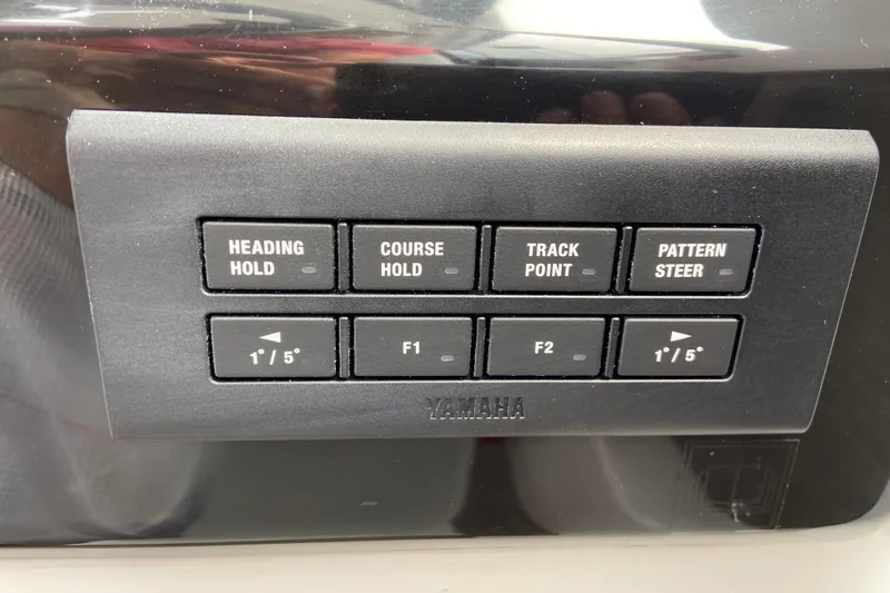Slide: The Image of Control panel of a 2026 Jeanneau NC 795 Series 2 boat with Yamaha buttons. - 27