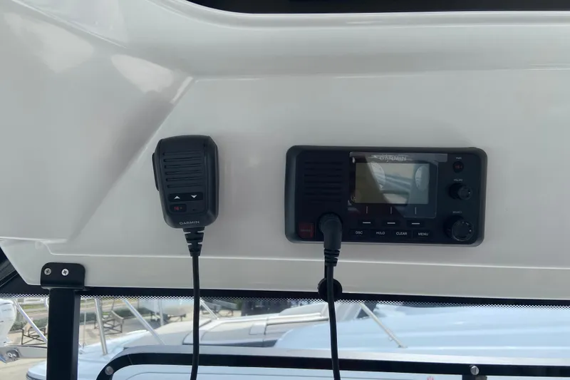 Slide: The Image of Garmin marine radio and microphone on Jeanneau NC 795 Series 2, 2026 model. - 29