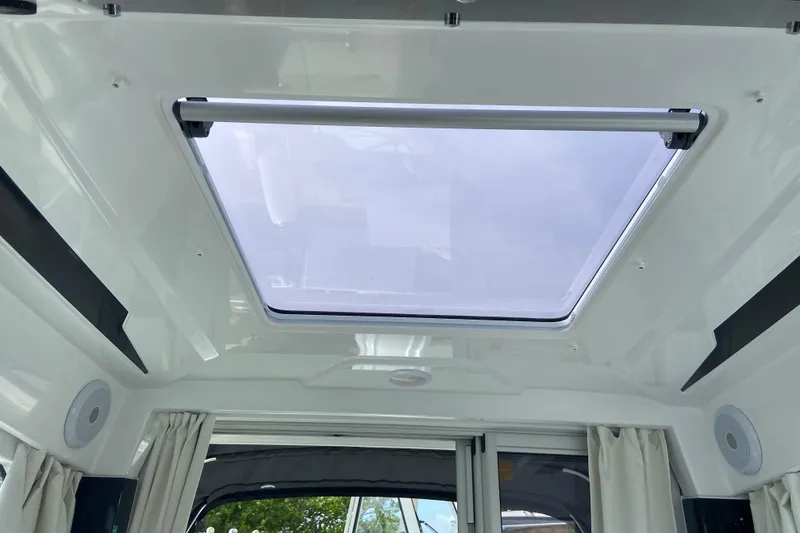 Slide: The Image of Interior view of 2026 Jeanneau NC 795 Series 2 boat's skylight and ceiling design. - 47