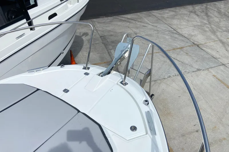 Slide: The Image of Bow view of 2026 Jeanneau NC 795 Series 2 boat with anchor and railing. - 50