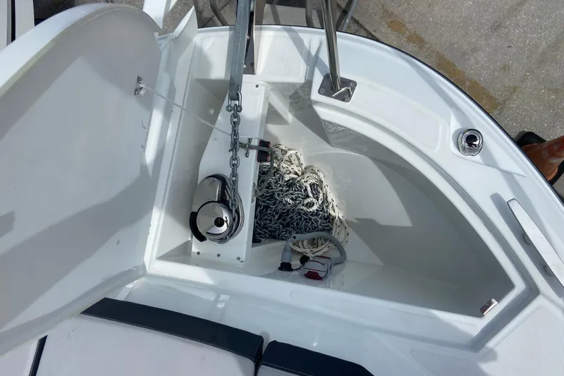 Slide: The Image of Anchor compartment of 2026 Jeanneau NC 795 Series 2 boat, featuring chain and rope storage. - 51