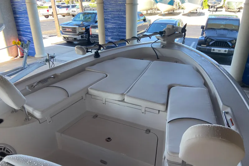 Slide: The Image of 2026 Sportsman Masters 267 Bay Boat interior with cushioned seating and modern design. - 20