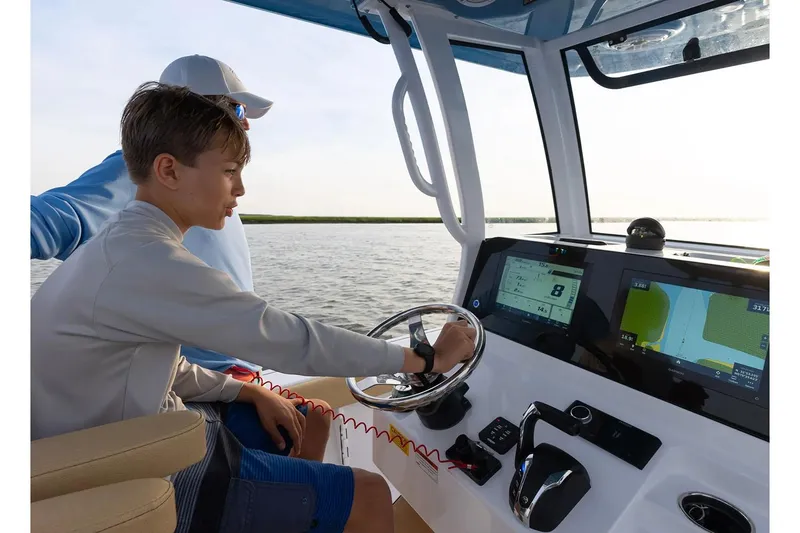 Slide: The Image of Helm with dual 12-inch Garmin displays - 6