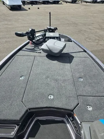 Slide: The Image of 2026 Ikon Boats LXE20 fishing deck with seating and control panel. - 3