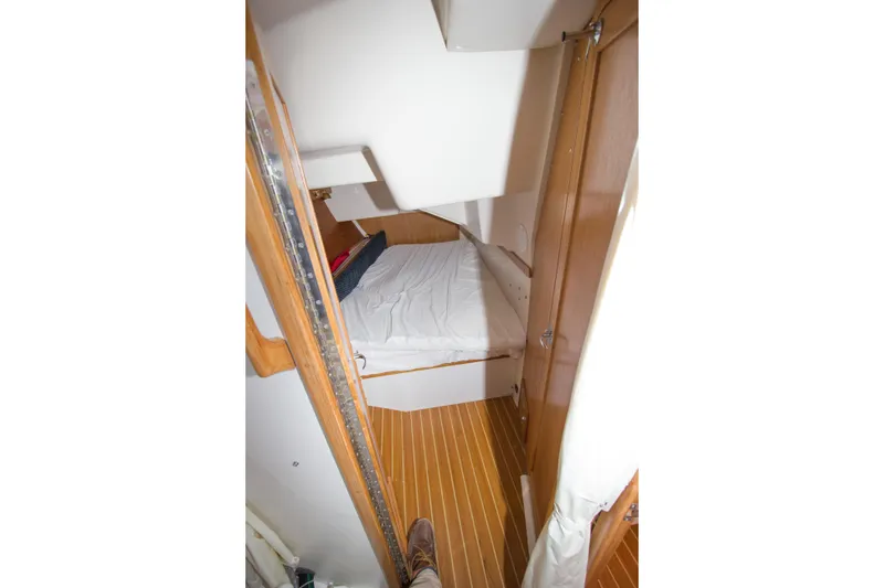 Slide: The Image of Interior cabin of 2008 Catalina 42 MkII sailboat with wooden flooring. - 24