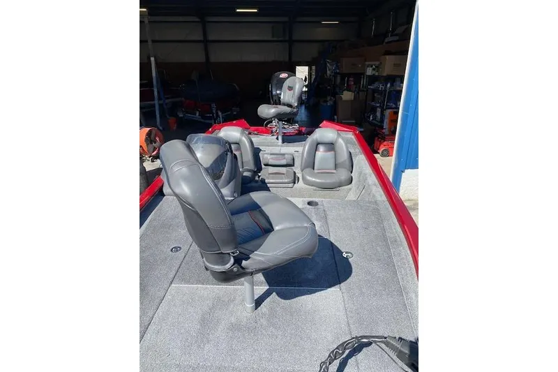 Slide: The Image of 2021 Bass Tracker Pro Team 195 TXW Team Edition boat interior with seating and equipment. - 10