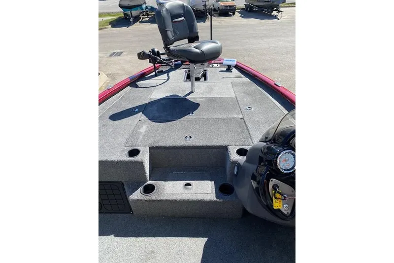 Slide: The Image of 2021 Bass Tracker Pro Team 195 TXW Team Edition boat interior with seating and storage. - 13