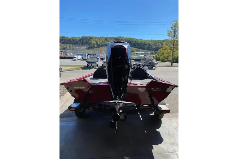 Slide: The Image of 2021 Bass Tracker Pro Team 195 TXW Team Edition boat, rear view in outdoor setting. - 6