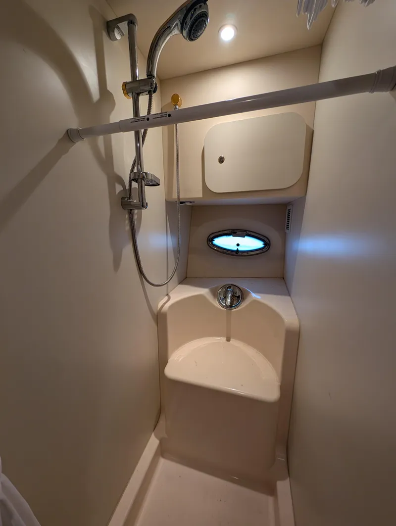 Slide: The Image of 2005 Silverton 34 Convertible shower with modern fixtures and compact design. - 10