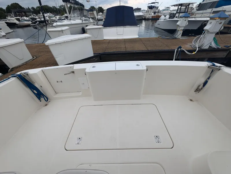 Slide: The Image of Open storage compartment on 2005 Silverton 34 Convertible boat deck. - 12