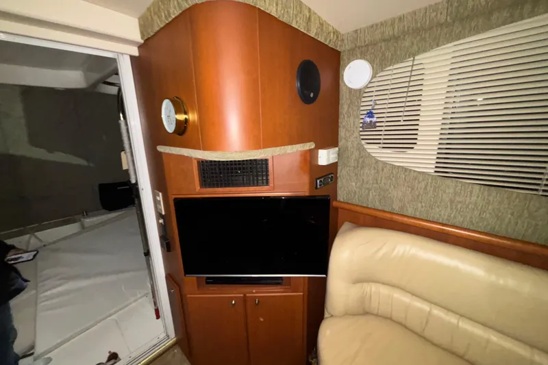 Slide: The Image of Compact shower area in a 2005 Silverton 34 Convertible boat. - 24