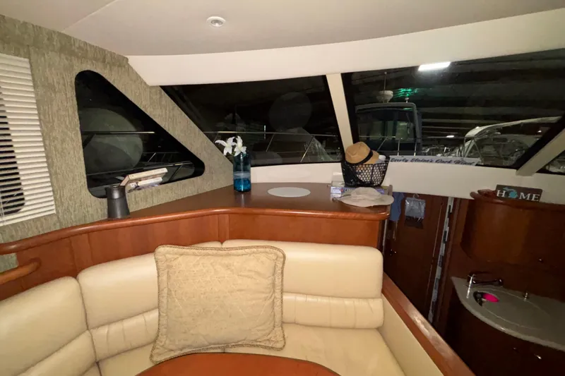Slide: The Image of Interior of 2005 Silverton 34 Convertible with bed and mounted TV. - 25