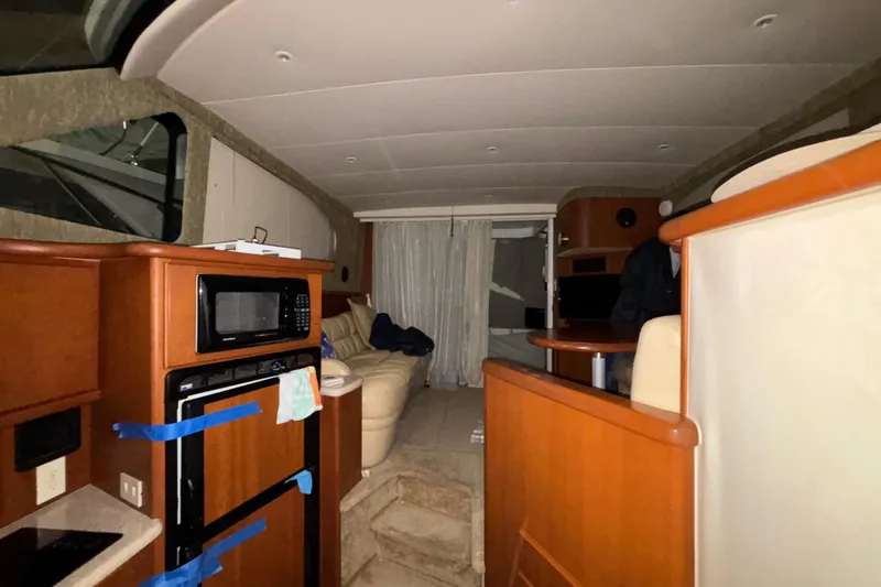 Slide: The Image of Interior view of 2005 Silverton 34 Convertible boat with steps and equipment. - 33