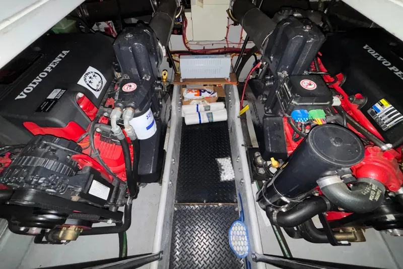 Slide: The Image of Engine compartment of a 2005 Silverton 34 Convertible boat, featuring a Volvo Penta engine. - 44