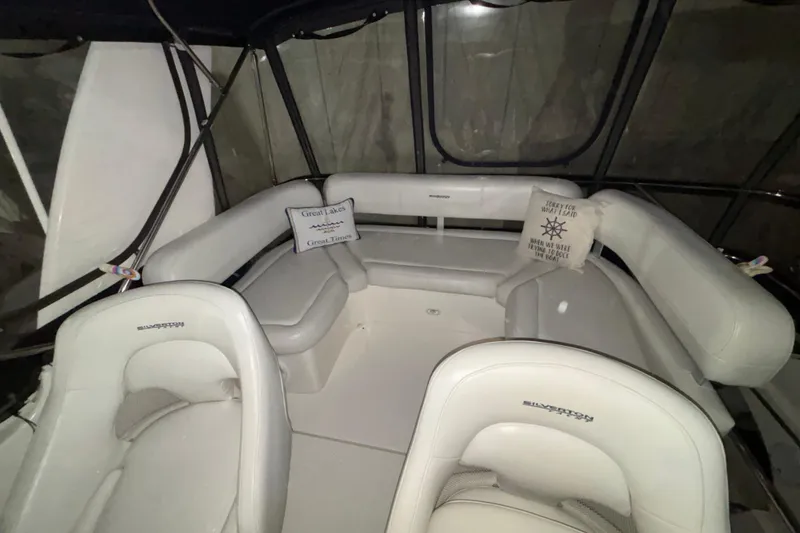 Slide: The Image of 2005 Silverton 34 Convertible yacht docked at marina, surrounded by sailboats. - 49