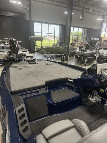 Slide: The Image of 2026 Ikon Boats VLX20 in showroom, featuring spacious deck and modern design. - 4