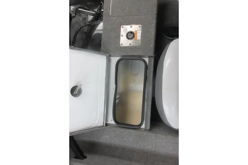 Slide: The Image of 2013 Alumacraft Competitor 175 SC boat interior storage compartment. - 11