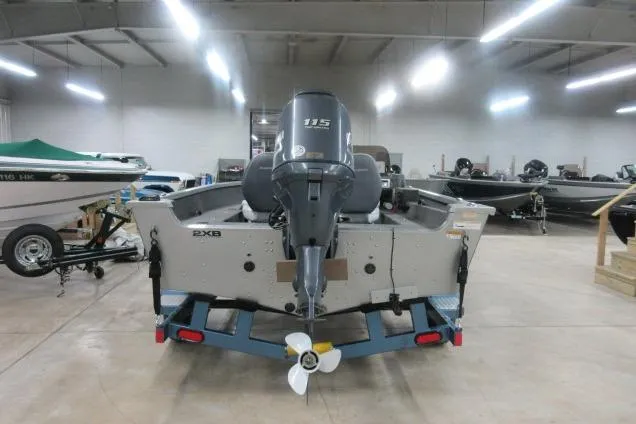 Slide: The Image of 2013 Alumacraft Competitor 175 SC boat with 115 HP motor in a showroom. - 5