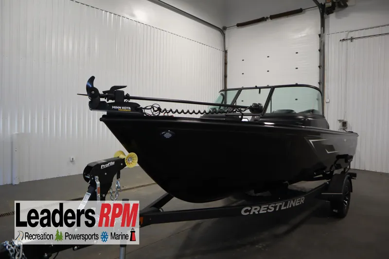 The Image of 2026 Crestliner 1850 Kodiak WT boat in showroom, featuring Minn Kota trolling motor. - 0
