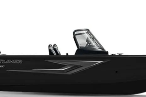 Slide: The Image of 2026 Crestliner 1850 Kodiak WT boat in a garage, front view. - 1