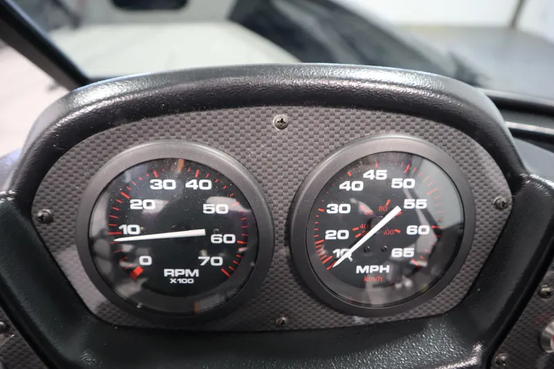 Slide: The Image of Dashboard of 2026 Crestliner 1850 Kodiak WT with speedometer and tachometer. - 25