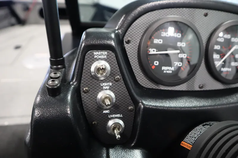 Slide: The Image of Dashboard of 2026 Crestliner 1850 Kodiak WT with switches and gauges. - 26