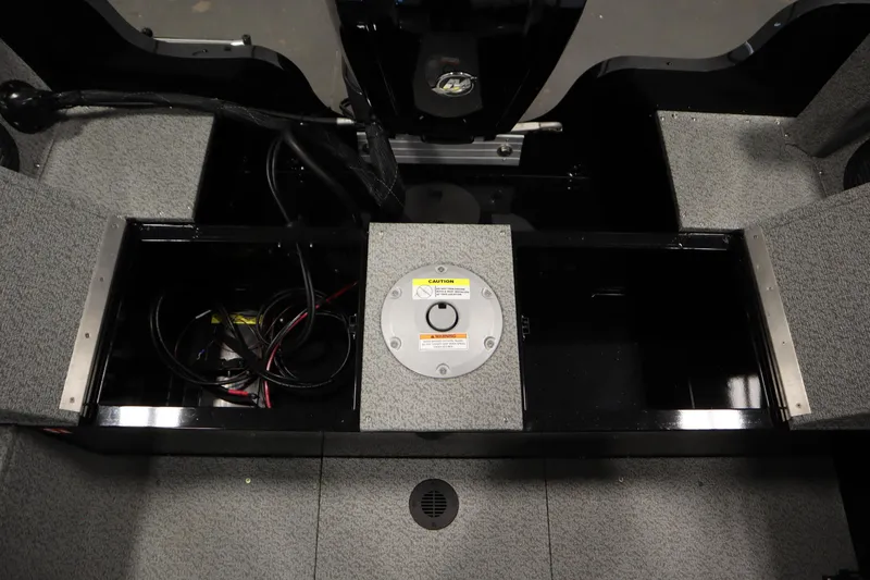 Slide: The Image of Interior view of 2026 Crestliner 1850 Kodiak WT boat storage compartments. - 38