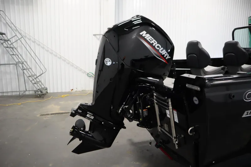 Slide: The Image of 2026 Crestliner 1850 Kodiak WT with Mercury outboard motor in a showroom. - 41