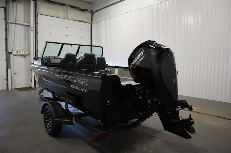 Slide: The Image of 2026 Crestliner 1850 Kodiak WT boat in warehouse. - 6