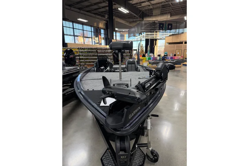 Slide: The Image of 2026 Phoenix 721 ZXL boat with Garmin equipment in a showroom. - 3
