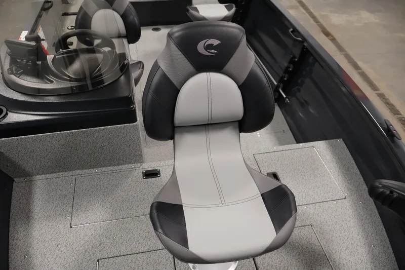 Slide: The Image of 2026 Crestliner 1850 Kodiak SC boat interior with sleek seating and console. - 15